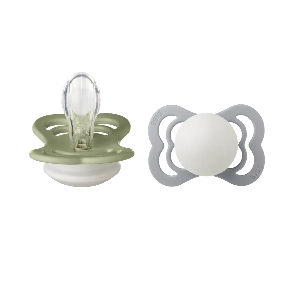 Napp Supreme Glow 2-pack Silikon Symmetrisk 0-6 mån - Sage/Cloud | Baby & Barn - Sköta - Nappar | BabyMode