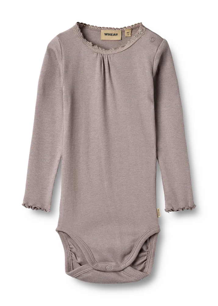 Wheat Lotta Rib Långärmad Body - Dusty Purple - 6 MDR. | Barnkläder - Bodys & overaller - Långärmad body | BabyMode
