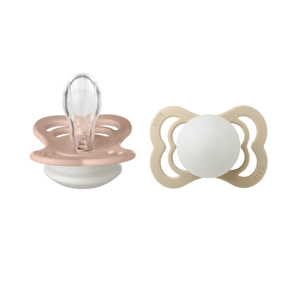 Napp Supreme Glow 2-pack Silikon Symmetrisk 0-6 mån - Blush/Vanilla | Baby & Barn - Sköta - Nappar | BabyMode